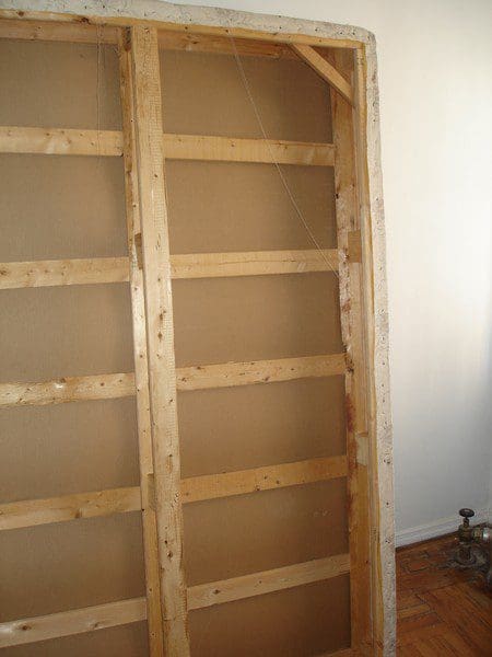 Close up image of a wooden rack inside a room